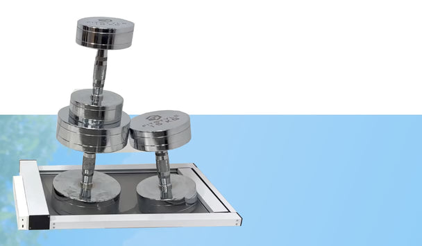 Metallic dumbbells on a stand with a blue gradient background