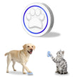 Smart pet training button with paw print design, used by dog and cat for interactive play and obedience training