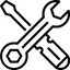 Crossed wrench and screwdriver icon on a white background